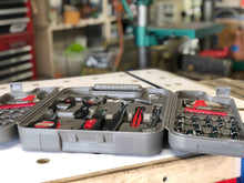 Apollo Tools 79 Piece Multi-Purpose Tool Kit - DT9411 shown open with blurred worshop in background