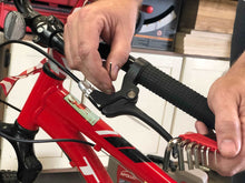 Apollo Tools 79 Piece Multi-Purpose Tool Kit - DT9411 shows man using hex key on bicycle handle