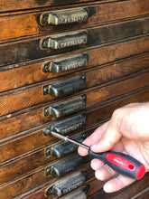 Apollo Tools 144 Piece Household Tool Kit with 4.8V Cordless Screwdriver - DT8422 screwdriver bit driver shown in use on drawer pull