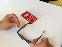 Apollo Tools 53 Piece Household Tool Kit - DT9408 shows man's hands using a precision screwdriver to tighten eyeglasses