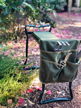 garden kneeler and seat open to seating position in garden background