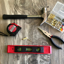 Apollo Tools 161 Piece Household Tool Kit with Convenient 3.6 Volt Lithium Ion Cordless Screwdriver - DT0739 shows a selection of tools against a wood background, including hammer, tape measure, pliers, level and hanging kit assortment set