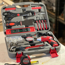 Apollo Tools 135 Piece Household Tool Set with Pivoting Dual-Angle 3.6 Volt Lithium-Ion Cordless Screwdriver - DT0773 shown all tools in and tape measure out against workshop background