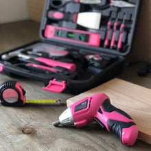 135 Piece Household Tool Kit Pink with Pivoting Dual-Angle 3.6 Volt Lithium-Ion Cordless Screwdriver - DT0773N1 tool set shown open with cordless and tape measure out of the box on wood background