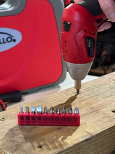 Apollo Tools 135 Piece Household Tool Set with Pivoting Dual-Angle 3.6 Volt Lithium-Ion Cordless Screwdriver - DT0773 shows cordless and bit bar in use in wood
