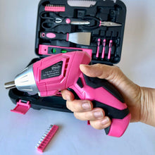 135 Piece Household Tool Kit Pink with Pivoting Dual-Angle 3.6 Volt Lithium-Ion Cordless Screwdriver - DT0773N1 shows hand holding the cordless screwdriver and the open set in the background