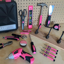 New and Improved 135 Piece Pink Household Tool Set with Pivoting Dual-Angle 3.6 Volt Lithium-Ion Cordless Screwdriver in Hard Case - DT0774P shows closed case and all tools against wood background