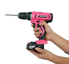 Apollo Tools 10.8 Volt Lithium-Ion Cordless Drill with 30 Piece Accessory Set PINK - DT4937P shows hands removing the battery