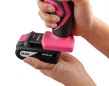 Apollo Tools 10.8 Volt Lithium-Ion Cordless Drill with 30 Piece Accessory Set PINK - DT4937P shows the battery being removed