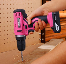 Apollo Tools 10.8 Volt Lithium-Ion Cordless Drill with 30 Piece Accessory Set PINK - DT4937P shows the drill in use, drilling through wood