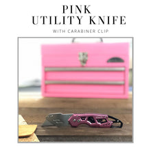 APOLLO TOOLS Ergonomic  Pink Utility Knife with Carabiner Clip and Fast-Change Blade - DT5017P shows product with Apollo Tool other product in background, blurred