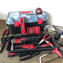APOLLO TOOLS 170 Piece Household Tool Kit with New and Improved Tool Box - DT7103 shows product and most tools out on a wood table