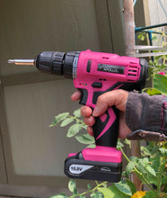 Apollo Tools 10.8 Volt Lithium-Ion Cordless Drill with 30 Piece Accessory Set PINK - DT4937P shown in hand