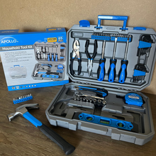 Apollo Tools 65 piece tool set with socket set: model DT0001 blue lifestyle image against wood background shows all tools and cardboard packaging