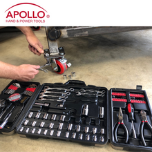 Apollo Tools 101 Piece Mechanics Tool Set SAE & Metric Tool Set open tool set with men's hands tightening with ratcheting tool and sockets