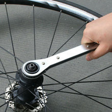 Apollo Tools 5 Ratcheting Wrenches - Metric - DT1213 shows one wrench in use on bicycle wheel