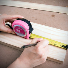 Apollo Tools 25ft. Tape Measure - Pink - DT5002P shows product in use in building situation