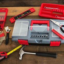 Apollo Tools 53 Piece Household Tool Kit with Tool Box - DT9773 lifestyle image shows product cases and a selection of tools on wood