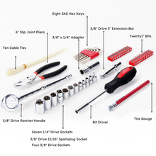 contains:  
•	Bit Driver
•	Tire Gauge
•	6" Slip Joint Pliers
•	3/8" Drive Ratchet Handle
•	3/8" Drive 3" Extension Bar
•	3/8" Drive 13/16" Sparkplug Socket
•	3/8" x 1/4" Adapter
•	Ten Cable Ties
•	Eight SAE Hex Keys
•	Four 3/8" Drive Sockets
•	Seven 1/4" Drive Sockets with Holder
•	Twenty 1" Bits: 1/8", 5/32", 3/16", 1/4", PH1, PH2, PH3, PZ1, PZ2, PZ3
