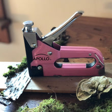 Pink Stapler with Power Adjustment Knob and 3000 Staples assortment-- DT5020P shows stapler in a DIY crafts setting
