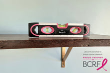 pink 9-inch torpedo-shaped spirit level with donation to breast cancer