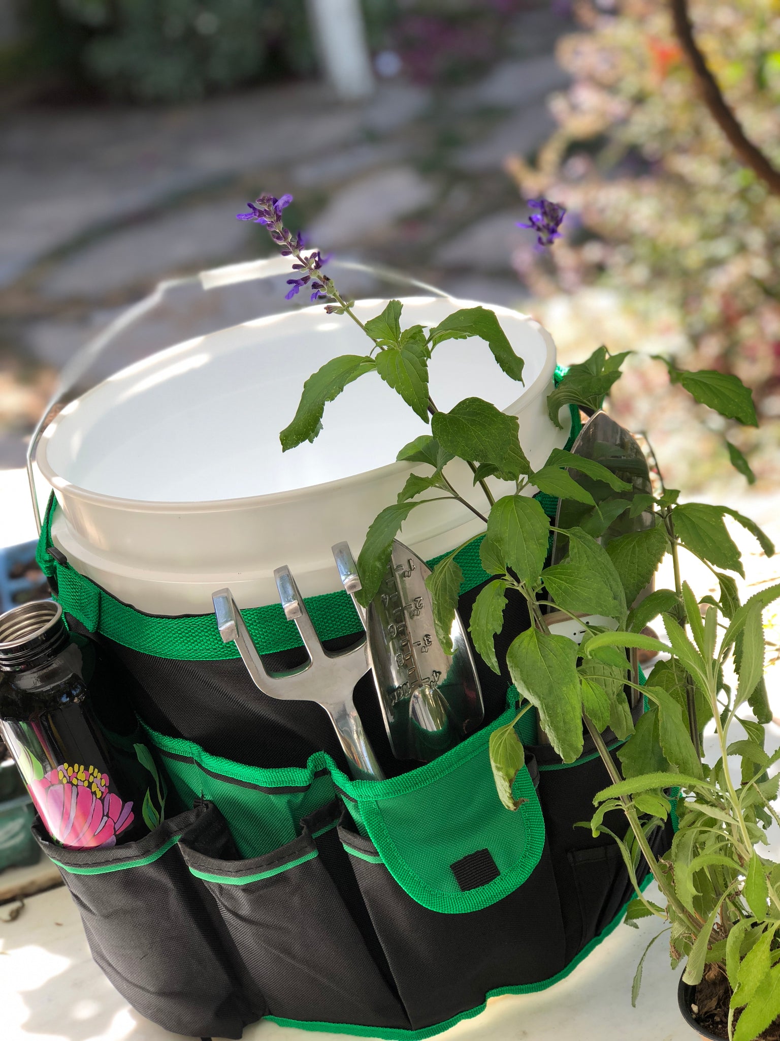 Bucket organizer converts bucket into storage with 34 pockets. Green